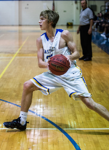 Evan King steals the basketball